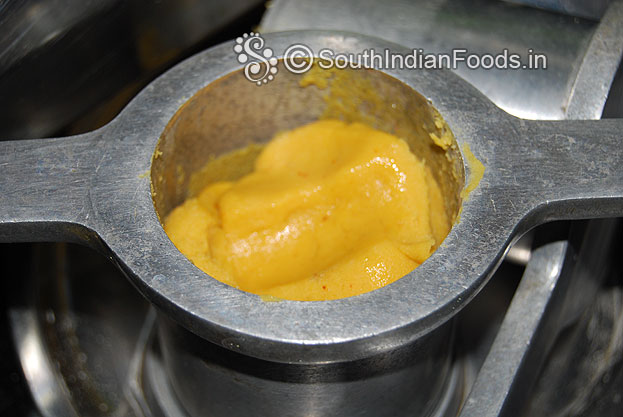 In a muruku kuzhal add lemon size dough & gently press