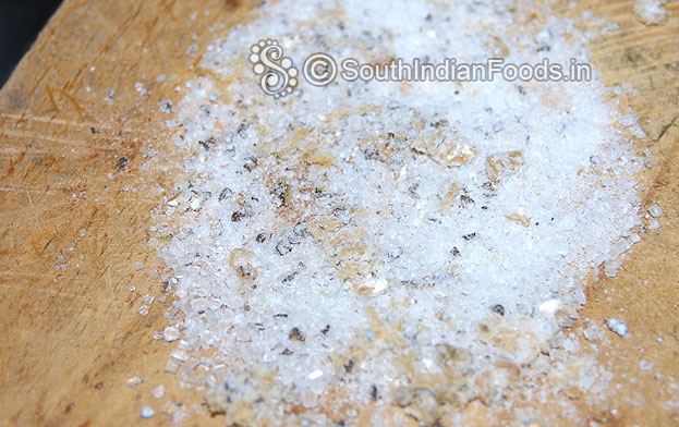 Add 1 tbsp sugar with cardamom seeds grind to fine powder