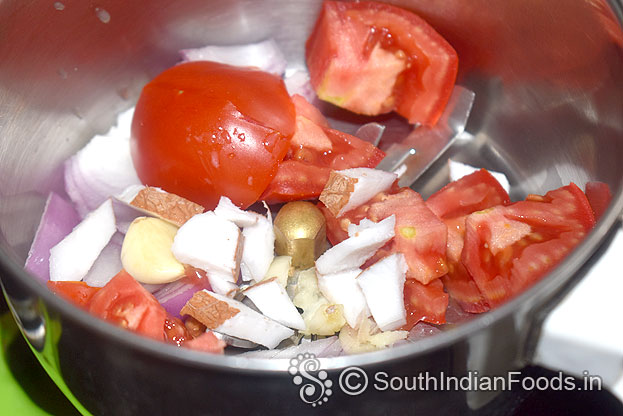 Grind tomato, onion, garlic, coconut