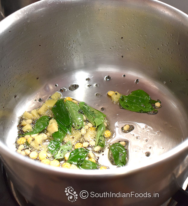Heat 2 tbsp oil in a pan add seasoning ingredients-Mustard, urad dal, bangal gram, ginger, curry leaves, green chilli