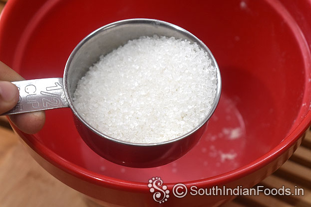 In a bowl add sugar